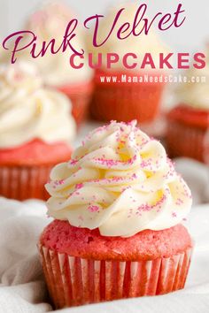 pink velvet cupcakes with white frosting and sprinkles