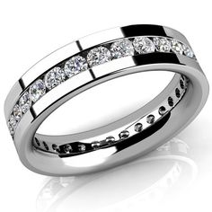 a white gold wedding ring with channeled diamonds