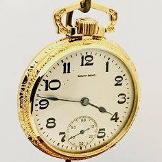 Antique South Bend pocket watch,size 16 ,19 jewels ,open face with clear display on the back showing watch movement,serial number 889151,adjusted for temperature and 4 positions, This is used as a salesman sample to show the buyers what the movement looks like,as you can see clearly,the watch is in excellent condition. . This watch has been serviced recently,as pocket watch service costs $150 these days,you are saving service cost for the first 2 years. These watches are 100 years old,we check t Light Codes, Vintage Clocks, Clock Repair, Pocket Watch Antique, Pocket Watch Chain, Open Face, South Bend, Watch Chain, Vintage Clock