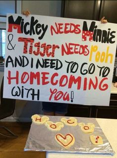 a sign that says mickey needs annie and tiger needs pooh and i need to go to home coming with you