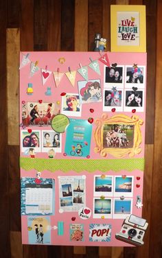 a pink refrigerator covered in pictures and magnets