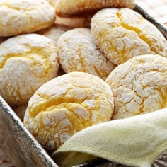 a basket filled with pastries sitting on top of a table