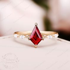 "(Please confirm your US size when you make an order) Jewelry Details -Gold Type : 18k gold / 14k gold / 10k gold (Choose One in Material Option) Center Stone: Lab Created Ruby 6*9mm, Approximately 1.0ct Color: 5A Clarity: VVS Cut: Kite Cut / 3EX Side Stone: Moissanite Side Stones Total Carat Weight: 0.16ctw Color: DF Clarity: VVS1 Cut: Marquise Cut / 3EX Band Width: approximately 1.5mm SKU: YR0911 ~*-*~Purchase Guarantee: - All our jewelry is handmade, and each process is refined. - 14 Day Refu Marquise Red Diamond Ring, Red Marquise Diamond Ring Fine Jewelry, Red Ruby Wedding Rings With Diamond Cut, Diamond-cut Ruby Ring, Wedding Ruby Ring With Diamond Cut Lab-created Ruby, Red Marquise Cut Diamond Ring - Fine Jewelry, Red Marquise Rings With Prong Setting, Red Ruby Ring With Marquise Cut Diamond, Marquise Red Ruby Ring For Anniversary