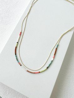 Gold Delicate Necklace With Tiny Beads, Layering Double Necklace, Minimalist Dainty Necklace, Colourful Minimal Boho Necklace - Etsy Minimalist Layered Necklace With Adjustable Delicate Chain, Minimalist Beaded Necklace With Delicate Adjustable Chain, Minimalist Adjustable Beaded Necklace With Delicate Chain, Minimalist Multicolor Beaded Chain Necklace, Delicate Beaded Necklaces With Adjustable Chain, Minimalist Beaded Necklaces With Adjustable Chain, Dainty Adjustable Double Strand Necklace, Dainty Double Strand Adjustable Necklace, Minimalist Adjustable Charm Necklace With Tiny Beads