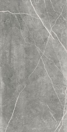 a black and white marble textured wallpaper with grey veining on the edges