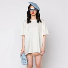 Lost In Your Mind Oversized T-Shirt Dress | S/M, M/L | White | Classic Cotton Fabrication | Small Scattered Distressed Holes | Crew Neckline | Short Sleeve| Relaxed Fit | Pullover Style | Lightweight, Breathable Fabric | Thick & Durable | Hits Mid Thigh | Perfect For Styling As A Layering Piece Over Shorts Or A Super Sexy Mini Skirt | 100% Cotton | 28" Shoulder-Hem | 7" Sleeves (Approx Measured From Size S/M) | Model Wearing Size S/M | Imported Lost In Your Mind, Tan T Shirt, Double Zero, Womens Knit Tops, Oversized T Shirt Dress, Olive Green Shorts, Yellow Tees, Poncho Tops, Beautiful Shorts