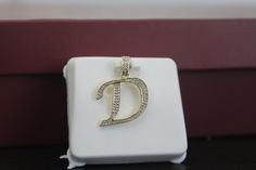 10 karat Gold with 0.10 Carat Natural Diamond  10 karat Real Gold (stamped)  Natural Diamond 0.10 Carat (Tested) Alphabet Pendant love it or Return It. Amazing quality Lowest Market price we offer customization. We accept returns if the item is in its original condition with tags and should be within 5 days of delivery. please help us maintain 5 star DSR rating in all 4 rating categories,if you feel otherwise,please let us know how can we score a perfect rating before you rate us. Thank you and 14k Gold Jewelry With Initials In White, White Diamond Personalized Jewelry, White Diamond Jewelry With Initials, Alphabet Pendant, Minimalist Pendant, Hip Hop Style, Market Price, Natural Gold, Gold Initial