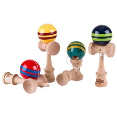 three wooden toys with different colors and sizes on each one, including an abacus