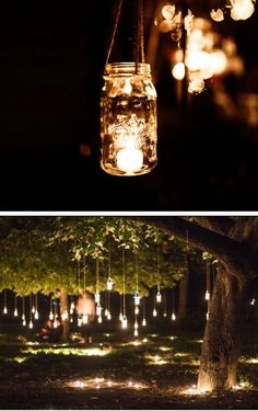 mason jar lights hanging from a tree in the dark and lit up by string lights