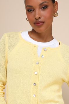 The Lulus Pristinely Cute Light Yellow Button-Up Cardigan is the perfect piece to layer over any of your favorite spring looks this season! Textured, ultra-lightweight knit shapes this sweet cardigan that features a classic crew neckline and long sleeves. The relaxed-fit bodice features a functional button placket along the center, before ending a hip-length hem. Fit: This garment fits true to size. Length: Size medium measures 18.5" from shoulder to hem. Bust: Great for any cup size. Waist: Loo Summer Knit Button-up Cardigan, Trendy Fine Knit Spring Cardigan, Spring Knit Sweater For Layering, Knit Sweater For Spring Layering, Spring Knit Cardigan For Work, Spring Yellow Soft Knit Sweater, Yellow Soft Knit Sweater For Spring, Spring Fine Knit Sweater For Work, Spring Workwear Fine Knit Sweater