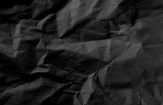 black and white photograph of crumpled paper