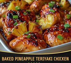 baked pineapple teriyaki chicken with sesame seeds and green onions in a white dish