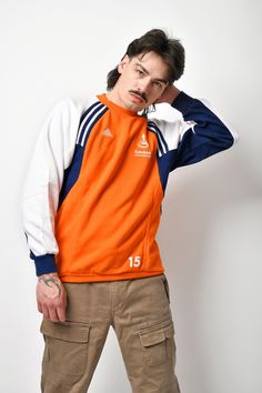 🚀Need to get your order super fast? Choose DHL Express shipping upgrade in your cart. It takes only 1-2 b. days to European Union countries and 2-5 b. days to USA, Canada and all other countries. Orders are ready to ship in 1 b. day. 🔥ADIDAS vintage men's sweatshirt in orange white blue colour. Size - XS (E 156). Model is 177 cm / 5ft 9.6" tall and usually wears size M. Good vintage condition. Only 1 available! All orders are shipped every day Worldwide from 🇪🇺EU. Safe registered standard de Adidas Vintage Sweatshirt, Sweat Adidas, Sweater Y2k, Mens 90s, Sport Sweater, Adidas Vintage, 90s Streetwear, Vintage Adidas, Y2k 90s