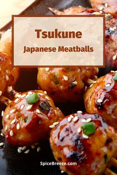 some meatballs with sesame seeds on them and the words tsukune japanese meatballs