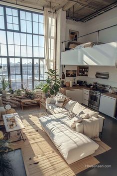 a living room filled with furniture and lots of windows next to a stove top oven