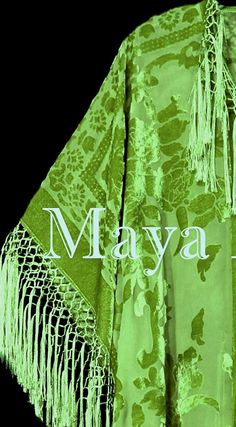 "DESCRIPTION : MADE IN USA BY MAYA Greenery Green fringe kimono burrnout velvet jacket opera coat Greenery - 2017 Fashion color of the year ! Cut in a Kimono style with hand knotted fringes down the front and around the hems Simply exquisite! You will not find this exact color anywhere , it is a hand dyed custom shade. As with all hand dyed fabrics each one is unique, but you will get a Light Olive Green the same or very close to the one in the photos Can be worn with many outfits One size Fits Velvet Fringe, Opera Coat, Light Olive Green, Fringe Kimono, Kimono Duster, Burnout Velvet, Custom Shades, Hand Dyed Fabric, Fringe Jacket