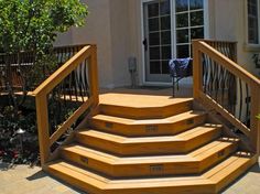 a set of wooden steps leading to a patio