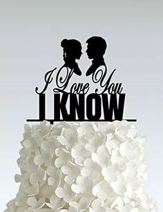 a wedding cake topper with the words i love you, i know on it