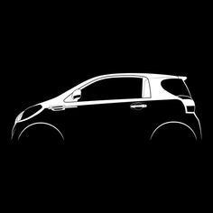 a black and white photo of a small car