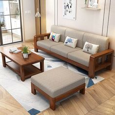 a living room filled with furniture and a wooden coffee table on top of a hard wood floor