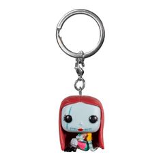 a key chain that has a doll on it