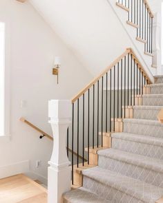 the stairs in this house are made of wood and metal