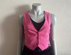 "Women's Vests Pink Vest Pink Women Waistcoat Romantic Classic  Fitted Small Size  Label size: S Measurements (lying flat): Length(back): 16\"/ 40.5 cm Pit to pit: 15.5\"/ 39.5 cm Waist: 13 3/4\"/ 35 cm Condition: great Vintage Condition N.B. Color may slightly differ from picture Please check measurements to insure a proper fit. Remember to allow yourself some extra room for movement. You can compare these with something from your closet that fits you well. Please convo me if you need additional measurements. SHIPPING * I ship worldwide via Priority mail  * I ship from Europe, so please allow 2 to 4 weeks for the package to arrive if you live overseas. * Europe 5 - 10 business days. 258 PRO" Chic Stretch Vest For Spring, Chic Fitted Vest For Spring, Fitted Pink Vest Outerwear, Spring Workwear Stretch Vest, Pink Fitted Vest For Winter, Pink Spring Vest For Workwear, Spring Workwear Pink Vest, Fitted Pink Vest For Fall, Pink Spring Vest For Work