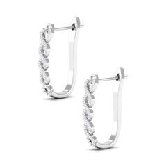 Product Details Experience unbeatable elegance with our Diamond Twisted Rope Earrings, featuring a unique and intricate motif adorned with fine twinkling diamonds. These earrings are a timeless and exquisite piece of jewelry that will elevate your style to new heights. Product Information SKU SHP-EARRINGS042210017 Weight 3.33 gm (Approximate) DIAMOND INFORMATION No.of Stones 74 Pieces Total Weight 0.43 Carat (Approximate) Dimension(approx) Round-0.90X0.90 mm-8 PcsRound-1X1 mm-66 Pcs Color HI Cut Luxury Diamond White Hoop Earrings With Pave Setting, Luxury Silver Diamond-cut Hoop Earrings, Classic Diamond-cut Diamond Hoop Earrings, High-quality White Gold Hoop Diamond Earrings, J Hoop, Rope Earrings, Luxury White Diamond-cut Hoop Earrings, Pave Setting, White Gold Earrings