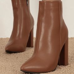 Elevate your style with these Classic Brown Chunky Heel Ankle Boots. Featuring a pointed toe and convenient zipper closure, these boots blend sophistication with everyday comfort effortlessly. Color: Brown Heel Type: Chunky heel Heel height: 4.72" / 120 mm approx Product measurements were taken using size 8. Please note that measurements may vary by size. Toe: Pointed toe Side zipper closure Handcrafted US sizing. Fits true to size. Fall Boots With Zipper Closure And Pointed Toe, Chic Brown Pointed Toe Platform Boots, Trendy Brown Boots With Zipper Closure, Trendy Brown Boots With Zipper, Brown Heeled Boots With Zipper For Winter, Brown Heeled Boots With Zipper Closure For Winter, Winter Brown Heeled Boots With Zipper Closure, Pointed Toe Boots With Zipper Closure, Brown Pointed Toe Heeled Boots With Zipper