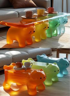 three glass bears are sitting on the coffee table