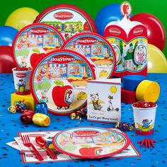 children's birthday party supplies including plates, cups and napkins