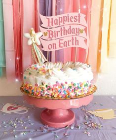 a birthday cake sitting on top of a table