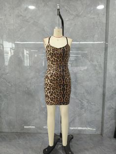 Leopard Pattern V-Neck Crisscross Backless Sequin Dress Leopard Club Dress, Leopard Print Knee-length Mini Dress For Party, Backless Sequin Dress, Chic Knee-length Leopard Print Mini Dress, Leopard Print V-neck Mini Dress For Party, Cheap V-neck Leopard Print Dress, Leopard Pattern, Sequin Dress, Criss Cross