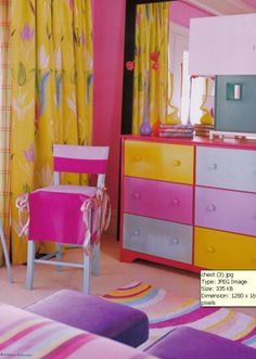 a bedroom with pink, yellow and purple furniture in it's decorating style