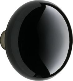 a black round object on a white background