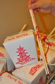 there are many boxes with chopsticks in them