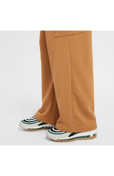 These midweight sweatpants are made of a cotton-blend French terry and styled with lots of pockets so they move through the day in comfortable confidence. Elastic waist with internal drawcord On-seam pockets; cargo flap-patch pockets 62% cotton, 38% polyester Machine wash, dry flat Imported Sporty Fall Sweatpants With Cargo Pockets, Nike Relaxed Fit Sweats With Elastic Waistband, Full-length Leisure Joggers With Pockets, Athleisure Full-length Sweatpants With Side Pockets, Comfortable Relaxed Fit Sweatpants With Hip Pockets, Oversized Casual Cargo Pants With Side Pockets, Nike Cotton Joggers, Nike Comfortable Sweatpants With Elastic Waistband, Nike Joggers With Pockets For Streetwear