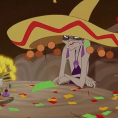 a cartoon character sitting in front of a fire with confetti on it's head