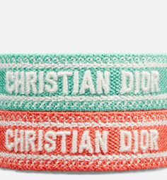 Part of the Dioriviera capsule, the Christian Dior bracelets are offered this season in new color combinations. The Christian Dior signature adorns coral and aquamarina cotton. The bracelets are adjustable with handmade tassel cords and can be worn for any occasion, alone or stacked.. Designer Adjustable Pink Bracelet, Designer Adjustable Pink Bracelets, Designer Pink Adjustable Bracelets, Designer Adjustable White Bracelets, Designer Adjustable Red Bracelets, Dior Armband, Coral Embroidery, Christian Dior Bracelet, Dior Bracelet