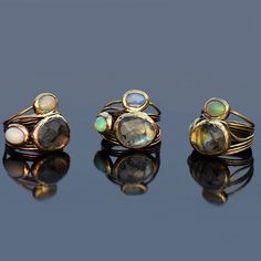 GemFormingStudio D E T A I L S Labradorite Ring | Fire Opal Ring | Wire Wrapped Ring | Gemstone Ring | Ring For Her, Ring For Women, Statement Ring, Stackable Ring, Unique Ring Size : All sizes Available Weight : 5.62 gm Stone Size : 16 x 13 mm Material : Brass Polish : Gold Polish . Contact us for wholesale prices. R I N G S https://www.etsy.com/in-en/shop/GemFormingStudio?section_id=22783374 B E A D S https://www.etsy.com/in-en/shop/GemFormingStudio?section_id=22828835 W A N D S https://www.et Adjustable Gold Stackable Rings With Multi-stone, Adjustable Gold Multi-stone Stackable Rings, Fusion Style Stackable Ring Jewelry, Fusion Style Stackable Open Ring Jewelry, Stackable Open Ring Fusion Jewelry, Fusion Style Hand Forged Rings As Gift, Hand Forged Fusion Style Ring As Gift, Hand Forged Fusion Style Rings For Gifts, Adjustable Hand Forged Fusion Rings