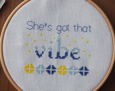 a cross stitch pattern with the words, she's got that vibe on it