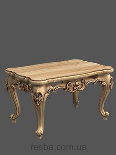 a wooden table with ornate carvings on the top and bottom, sitting in front of a gray background