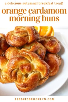 orange cardamoon morning buns on a white plate