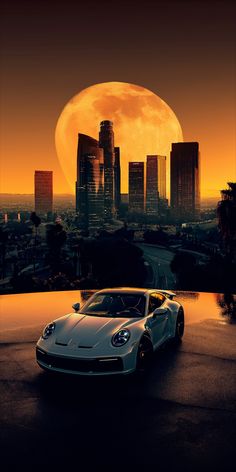 a white sports car is parked in front of a cityscape with the moon rising behind it