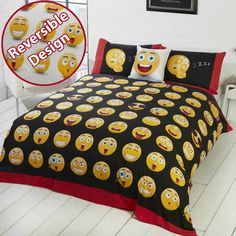 the bed is covered with emotictive smiley faces on black and red linens