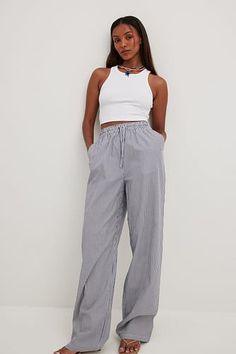 Elastic Waist Linen Trousers White | NA-KD Relaxed Fit Cotton Pants With Tie Waist, Trendy Pants With Tie Waist, Trendy Cotton Pants With Tie Waist, Trendy Cotton Bottoms With Tie Waist, Cotton Wide Leg Pants With Tie Waist For Loungewear, Cotton Wide Leg Pants With Tie Waist For Work, Casual Wide Leg Pants With Drawstring For Work, Casual Wide Leg Pants For Work With Drawstring, Summer Wide Leg Pants With Drawstring For Work