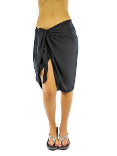 PRICES MAY VARY. Luxury Divas brand womens sarong wrap is short and falls just below the knee. Solid color, high quality fabric is semi sheer to provide light coverage with a surged finished edge. A perfect accessory for beachwear, resort wear, pool and cruise wear. Perfect gift for everyone on your list. S01651 This classic mid length womens sarong wrap is a swimsuit season essential. Made of a lightweight silky material, our sheer beach wrap is easy to fold up for travel & dries quickly. These Black Sarong, Georgette Material, Sarong Wrap, Swimsuit Season, Beach Wrap, Black Knees, Women's Cover Up, Swimsuit Cover Ups, Swimsuit Cover