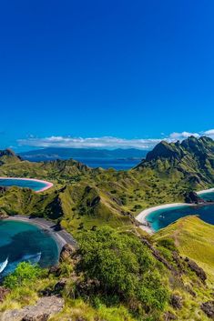 an aerial view of the coastline and lagoons in new zealand, with blue water