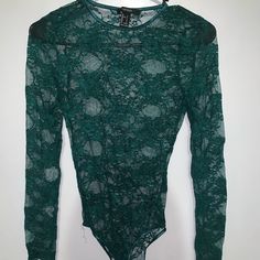 Beautiful Emerald Green Lace Bodysuit Never Worn Women's Size Small Color: Emerald Green Material Lace Brand: Forever 21 Green Fitted Bodysuit For Party, Fitted Green Bodysuit For Night Out, Forever 21 Party Bodysuit With Lined Body, Forever 21 Spring Bodysuit With Lined Body, Spring Lined Bodysuit By Forever 21, Spring Bodysuit With Lined Body From Forever 21, Forever 21 Long Sleeve Bodysuit For Spring, Forever 21 Spring Bodysuit For Night Out, Forever 21 Bodysuit For Night Out In Spring