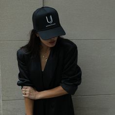 Show off your UJ obsession with our Uncommon James Hat. This black trucker hat features our iconic logo and looks good with everything. For a full look, make sure you get our Uncommon Sweatshirt and Unlikely To Apologize Sweatshirt. Want more styles? Shop our full apparel line. Urban Black Trucker Hat With Letter Print, Black Snapback Hat For Fall, Curved Bill Snapback Hat For Streetwear, Fall Streetwear Baseball Cap, Black Trucker Hat With Letter Print For Everyday, Black Trucker Hat With Curved Visor For Everyday, Black Trucker Hat One Size Fits Most For Everyday, Black Everyday Trucker Hat One Size, Fall Streetwear Baseball Cap With Curved Brim